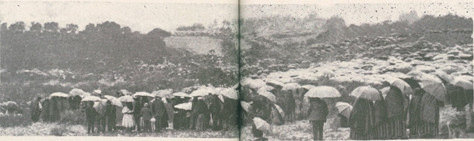 Pilgrims waiting in the rain at the Cova da Iria on the morning of 13 October 1917.